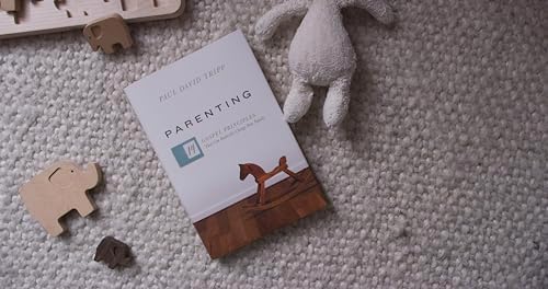 Parenting: 14 Gospel Principles That Can Radically Change Your Family (with Study Questions) by Paul David Tripp