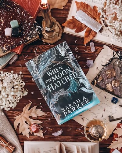 When the Moon Hatched: A Fast-Paced Romantasy with Undeniable Chemistry in a Stunning Immersive World (The Moonfall Series, 1) by Sarah A. Parker