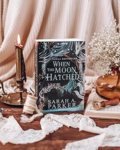 When the Moon Hatched: A Fast-Paced Romantasy with Undeniable Chemistry in a Stunning Immersive World (The Moonfall Series, 1) by Sarah A. Parker