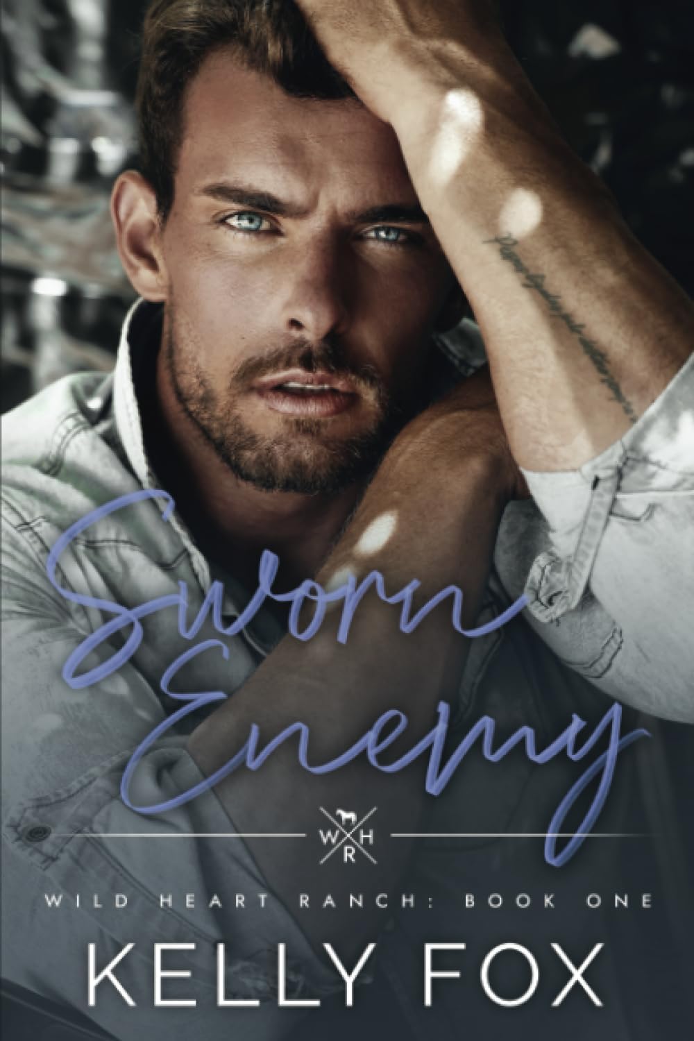 Sworn Enemy: An MM Enemies-To-Lovers Book (Wild Heart Ranch) by Kelly Fox