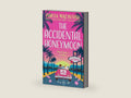 The Accidental Honeymoon: A hilarious rom-com from the author Wish You Weren’t Here, perfect for fans of fake dating romance to read in 2026 by Portia MacIntosh | barcode:9780008241001 | source:'9780008241001-right-three-quarter.jpg