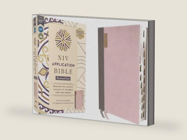 NIV Application Bible, Personal Size, Leathersoft, Pink/Gray, Red Letter, Thumb Indexed, Comfort Print: Bringing the Ancient Message of the Bible into Your World by Zondervan | barcode:9780310465270 | source:'9780310465270-right-three-quarter.jpg