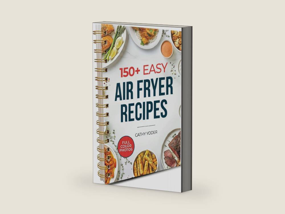 Cathy Yoder's Air Fryer Cookbook: Air Fryer Cookbook for Beginners to Advanced, 150+ Easy, Delicious, Healthy Air Fryer Recipes Cookbook, Cooking Effortless AirFryer Meals with Pictures Cook Book by Cathy Yoder | barcode:9780578259130 | source:'9780578259130-right-three-quarter.jpg