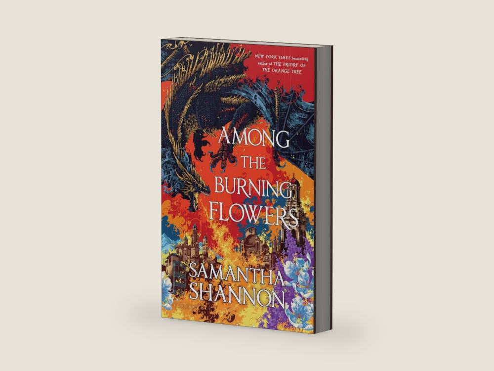 Among the Burning Flowers: A Novel (The Roots of Chaos) by Samantha Shannon | barcode:9781639736010 | source:'9781639736010-right-three-quarter.jpg