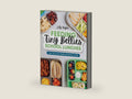 Feeding Tiny Bellies: School Lunches: Over 100 Lunch Boxes and Snacks for Kids by Lily Payen | barcode:9798217140282 | source:'9798217140282-right-three-quarter.jpg