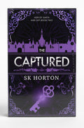 BestBuyBook cover of The Captured by SK Horton, featuring a purple key and castle silhouette on a dark background.