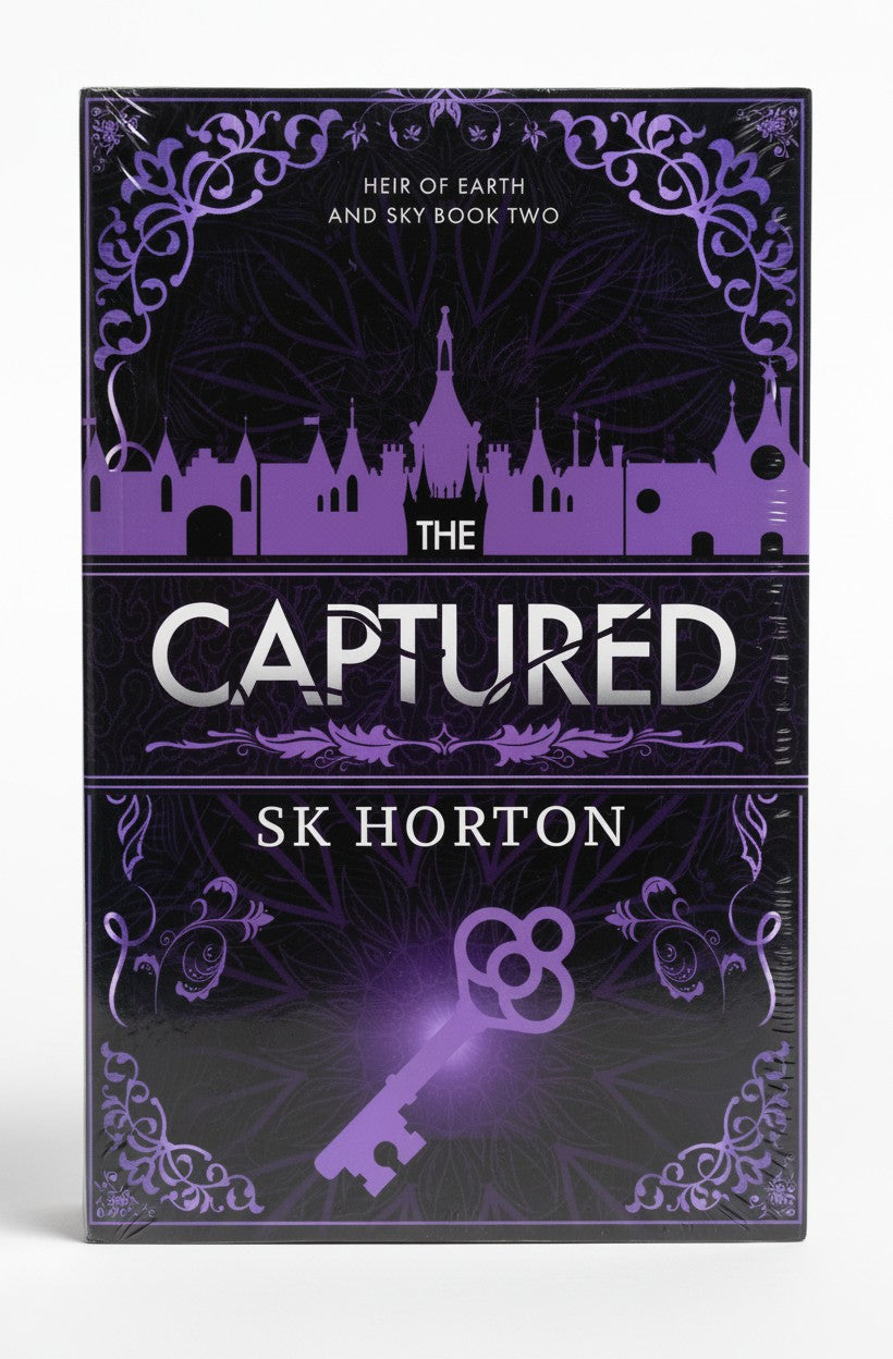 BestBuyBook cover of The Captured by SK Horton, featuring a purple key and castle silhouette on a dark background.