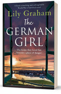 BestBuyBook paperback cover of The German Girl by Lily Graham featuring an open window view of a sunset cityscape